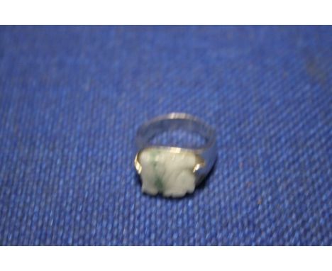 A SILVER AND JADE SIGNET RING