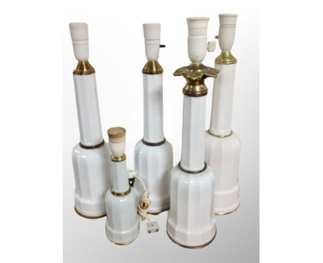 Five Danish gilt porcelain lamp bases, tallest 49 cm 