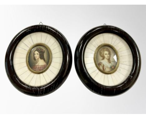 British School (19th Century) : A pair of portrait miniatures of ladies on oval panel, in piano key ivory frames, each 12.5cm