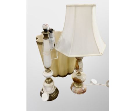A brass and marble lamp base and a further onyx example 