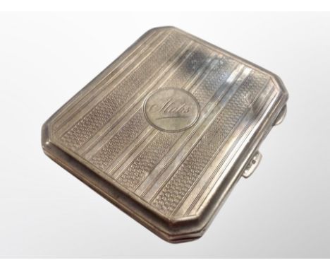 A silver cigarette case with engine turned decoration  CONDITION REPORT: 85.6g 