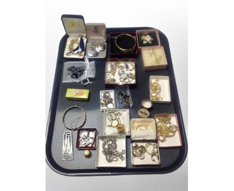 A collection of costume jewellery including gold plated bangles, necklaces, Celtic crucifix pendant, heart stone bracelet, ye