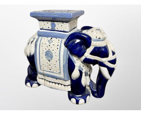 A ceramic elephant plant stand, height 45 cm 