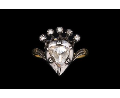 A GEORGIAN ROSE CUT DIAMOND RINGDesigned as a coronet, mounted with the principal foil backed triangular diamond below a curv