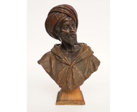 GOLDSCHEIDER: POLYCHROME TERRACOTTA BUST OF A MANEarly 20th CenturyModelled as a bearded gentleman in buttoned textured coat 