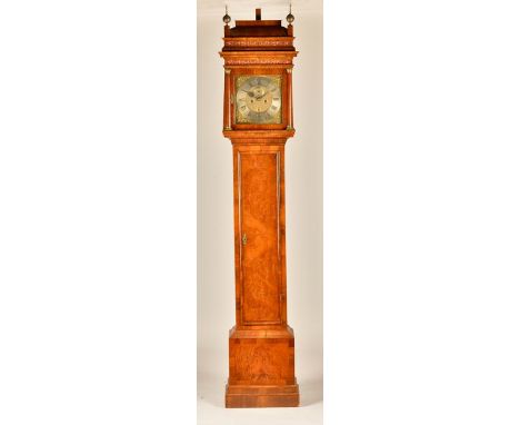 A GEORGE I WALNUT STRIKING LONGCASE CLOCKThe movement by Daniel Quare, London, the case early 18th century and laterThe hood 