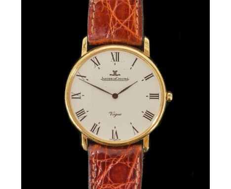 A GOLD CASED JAEGER-LECOULTRE QUARTZ WATCHCirca 1980s, the signed circular cream dial with Roman numerals, case back detailed