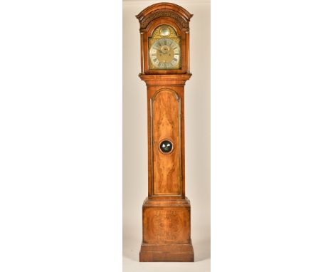 A GEORGE II  WALNUT LONGCASE CLOCKThe movement signed Robert Sadler, LondonThe arched hood with a deeply-moulded edge above f