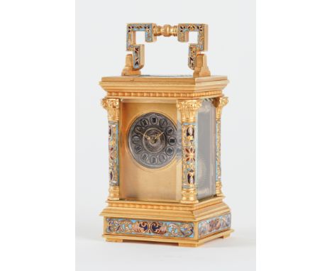 A FRENCH GILT-BRASS AND CHAMPLEVE ENAMEL MINIATURE CARRIAGE TIMEPIECERetailed by Sennet Freres, Paris, circa 1900In an Anglai