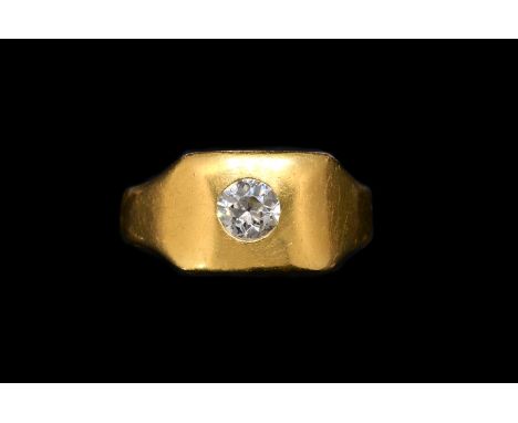 A DIAMOND SET SIGNET RINGGypsy set with a cushion shaped diamond, (estimated diamond weight 0.30 carats) London 1921, ring si