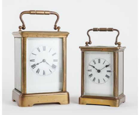 A FRENCH BRASS CARRIAGE CLOCK AND A CARRIAGE TIMEPIECE (2)The larger clock in a Corniche case, with original silvered platfor
