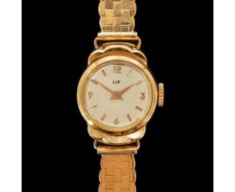 A FRENCH LADIES LIP GOLD MANUAL WIND BRACELET WRISTWATCHThe signed cream dial with Arabic numerals and baton hour markers, ca