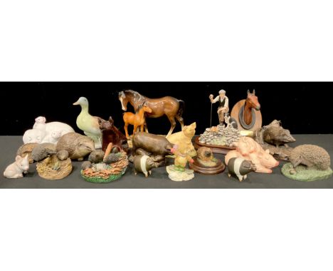 A Beswick model, of a horse and foal; a Border Fine Arts model, of a shepherd and sheepdog; a Beswick Little Likeables model,