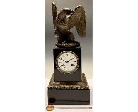A 19th century bronze mounted black marble library mantel clock, 8.5cm enamel dial inscribed with Roman numerals, the case cr