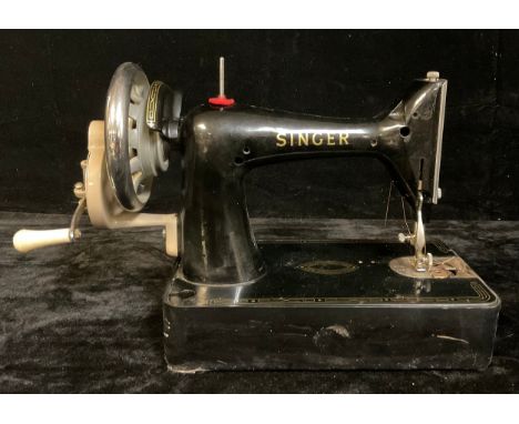A Singer manual sewing machine, number 99K, original soft cover 