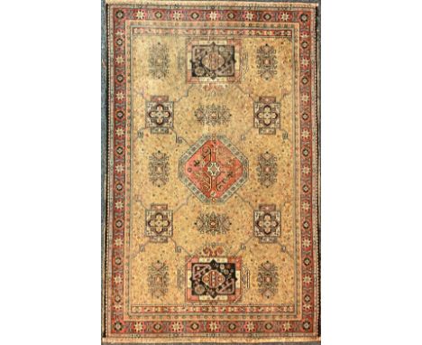 A Middle Eastern carpet, 84" x 54"