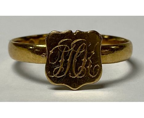 A Victorian 22ct gold signed ring, monogrammed central shield, size O, Birmingham 1867, 2.38g 