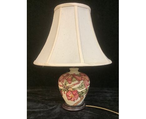 A Moorcroft magnolia pattern ovoid table lamp lamp 