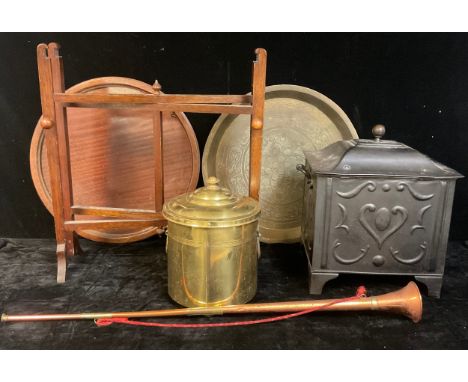 A log bin, hinged domed cover, embossed with Art Nouveau style motifs, 50cm wide; a brass cylindrical coal bin and cover; a f