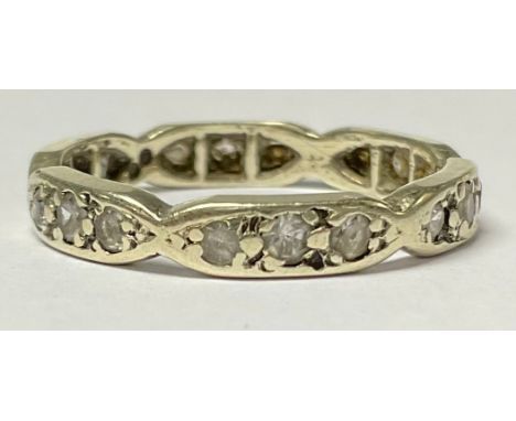 A 9ct white gold eternity ring, set with clear stones, size L/M, marked 375, 2.2g, boxed 