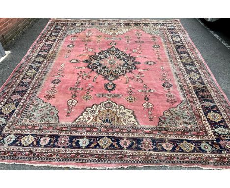 A substantial woollen carpet, 447cm x 374cm 