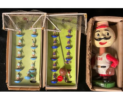 A Japanese novelty baseball player, Cincinnati Reds, nodding head, boxed; two sets of Subbuteo 00 scale team players, each bo