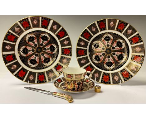 A pair of Royal Crown Derby Imari palette 1128 pattern dinner plates, seconds; an 1128 patern teacup an saucer, second; a pis