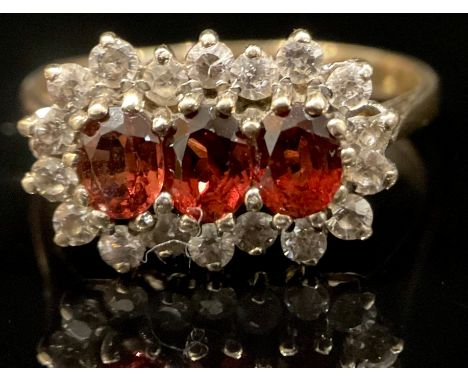 A 9ct gold garnet and cubic zirconia ring, size U, marked 375,  3.6g 