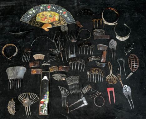 An early 20th century simulated tortoise shell hair comb; others similar, early moulded plastic and similar composite; a Span