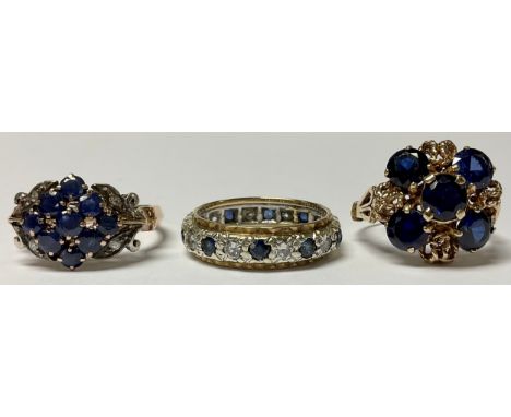 A 14ct gold ring, set with an arrangement of nine blue stones, four diamond chips, one to each angle, size Q, 5.1g; a 9ct gol
