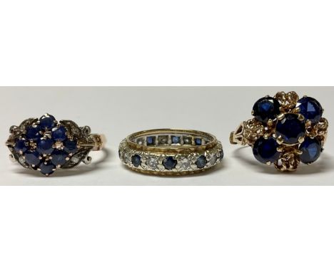 A 14ct gold ring, set with an arrangement of nine blue stones, four diamond chips, one to each angle, size Q, 5.1g; a 9ct gol