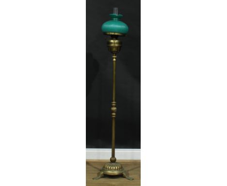 A late 19th/early 20th century floor standing oil lamp, 164cm high overall 