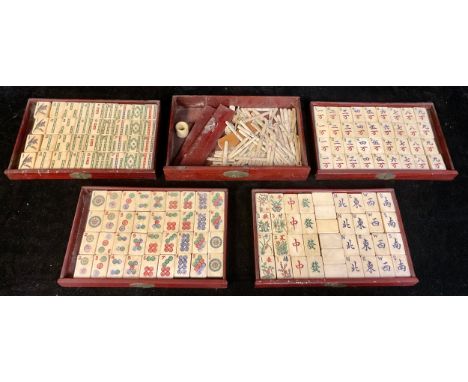 A set of Mah Jong bone tiles and dice, score sticks, in four drawers 