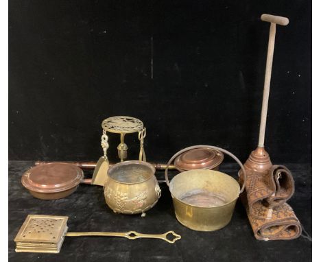 A 19th century copper warming pan; another; a brass jam pan; a brass combination trivet and fireside companion; a small Middl