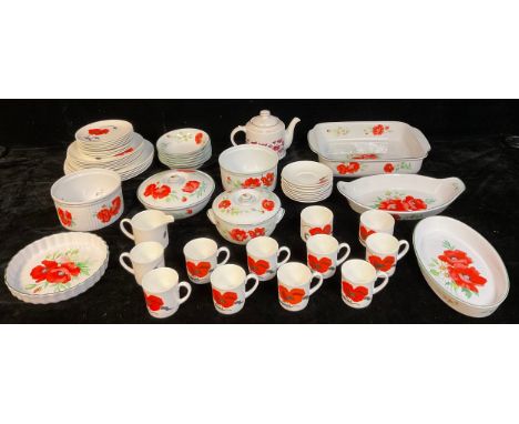 A Wedgwood Susie Cooper design Cornpoppy pattern part dinner and tea service comprising dinner plates, dessert plates, side p