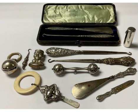 A silver baby rattle, Birmingham hallmarks; others; a silver bookmark; a silver scent bottle, London 1883, lacking stopper; a