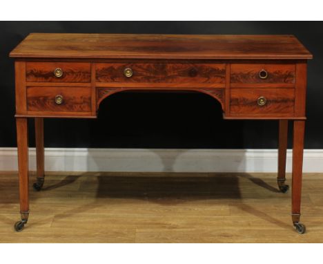 A George III Revival mahogany side table, formerly a dressing table, by S.E &amp; R Johnson, Warrington, stamped, 75.5cm high