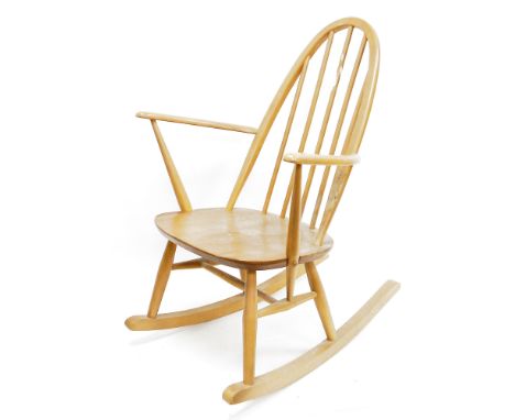 Ercol blonde elm and beech rocking chair, 85cm high, 62cm wideCondition ReportSurface marks, scuffs and accretions. Some fadi