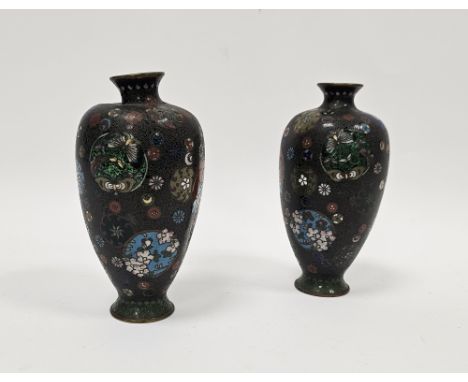 Pair of Japanese Meiji period (1868-1912) cloisonne enamel oviform vases, each decorated with mons, flowers, insects and scal