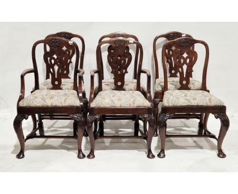 Set of six early 20th century mahogany Georgian-style dining chairs, including two armchairs, each with foliate carved cresti