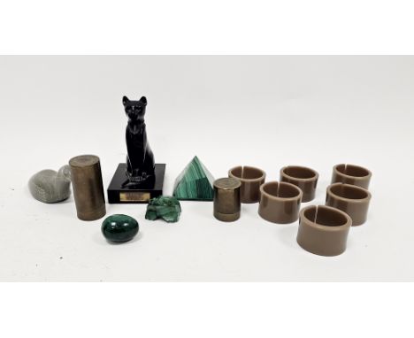 Set of retro brown plastic napkin rings, a carved Canadian Eskimo art soapstone model&nbsp;of a bird, a malachite pyramid, a 
