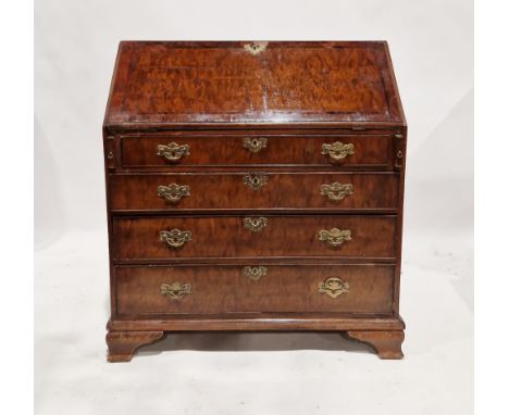 Georgian mahogany bureau, the fall front opening to reveal a blue gilt leather inset top and an assortment of fitted drawers 