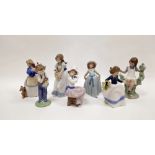 Lladro porcelain figure of a girl, 18.5cm high and six Nao figures similar, various printed and
