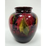 Moorcroft 'Leaf and Berry' pattern oviform vase, 20th century, painted and impressed marks, tube