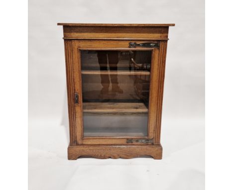 Late 19th/early 20th century oak pier cabinet&nbsp;with Art Nouveau hammered copper finish door bracket and escutcheon, the g