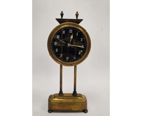 1920's English brass-cased gravity clock&nbsp;stamped PAT.15238-19, ivory-coloured enamelled hands, with vertical balance esc