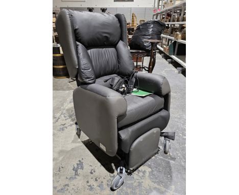 Yorkshire Care Equipment Lento care chair with a selection of related cables and user manual, 128cm high 