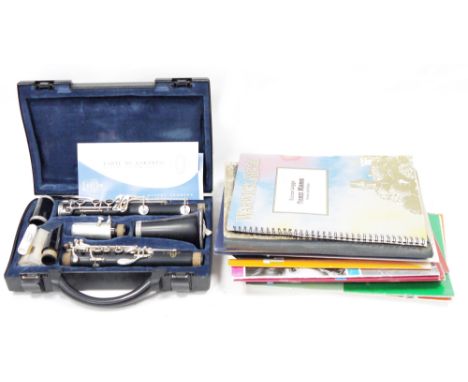 Buffet, Crampon &amp; Sons Paris ebony clarinet&nbsp;in hard case, model B12 and a collection of sheet music&nbsp;