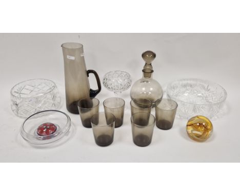 1970's smoke tinted glass part service comprising a globular decanter and stopper, six beakers and a flared cylindrical jug, 