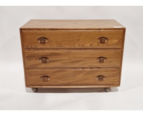 Ercol Windsor pattern blonde chest of&nbsp;three long drawers, raised on original castors, 67cm high x 91cm wide x 45cm deep&